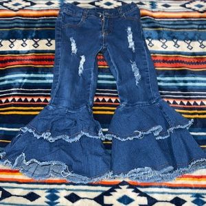 Boutique distressed bell bottoms